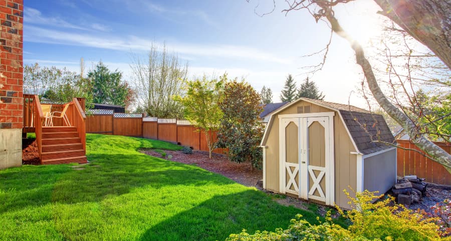 Fenced backyard with storage shed in Washington DC